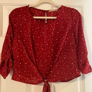 Red blouse with stars and tie